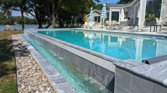 A swimming pool by Coastal Pools in Maryland and Delaware